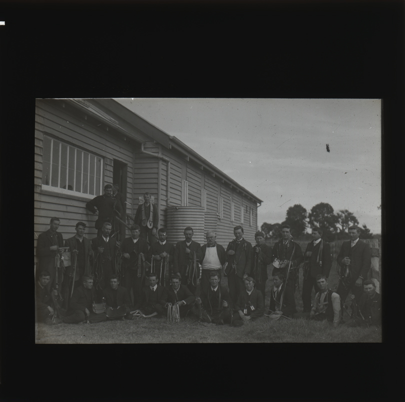 Group of students displaying their various leatherworks [Hawkesbury Agricultural College (HAC)]