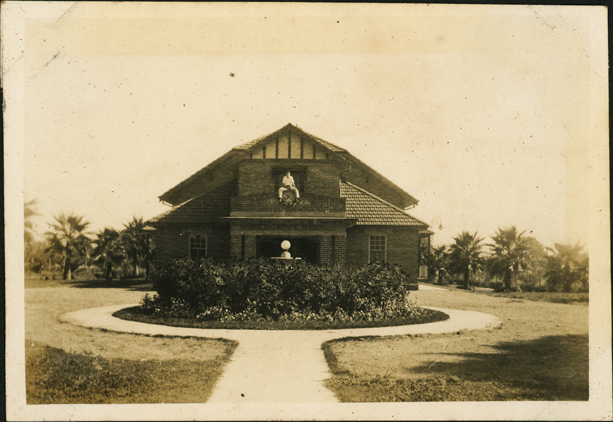 Memorial Hall - Student sitting above entrance porch - 1936 [Hawkesbury Agricultural College (HAC)]