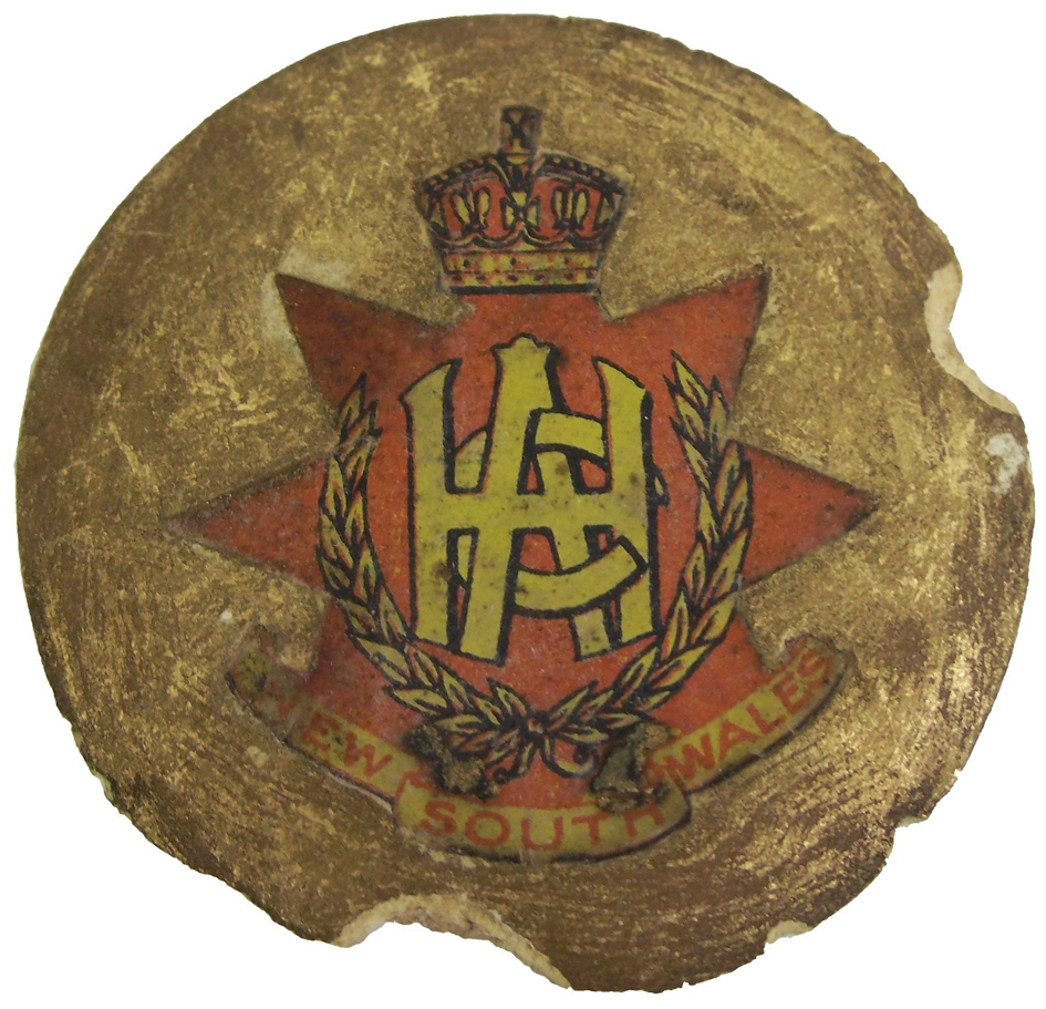 Crest/Logo - Hawkesbury Agricultural College (HAC) - On gold base on a plaster disc