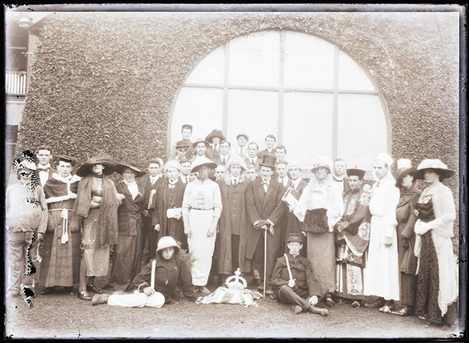 Large group of students in quadrangle dressed in costume, possibly for Empire Day celebrations [Hawkesbury Agricultural College (HAC)]