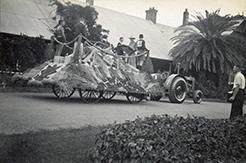HAC students on floats pulled by a tractor
