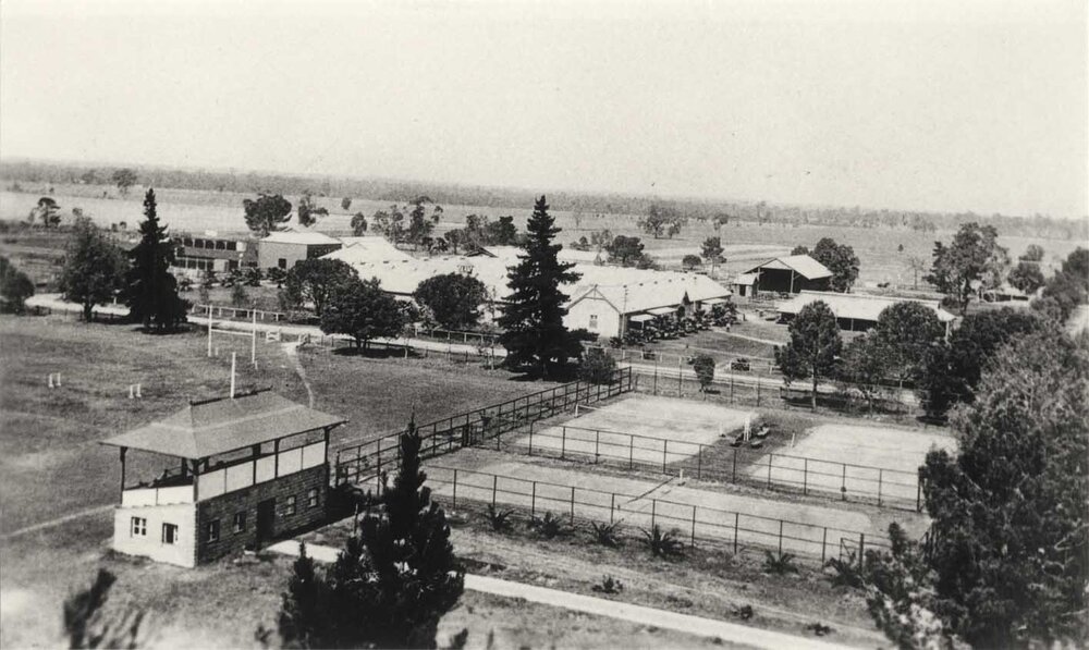 Sports pavilion (grandstand) and tennis courts with Stable Square in background - Print 1 of 2 (uncropped) [Hawkesbury Agricultural College (HAC)]