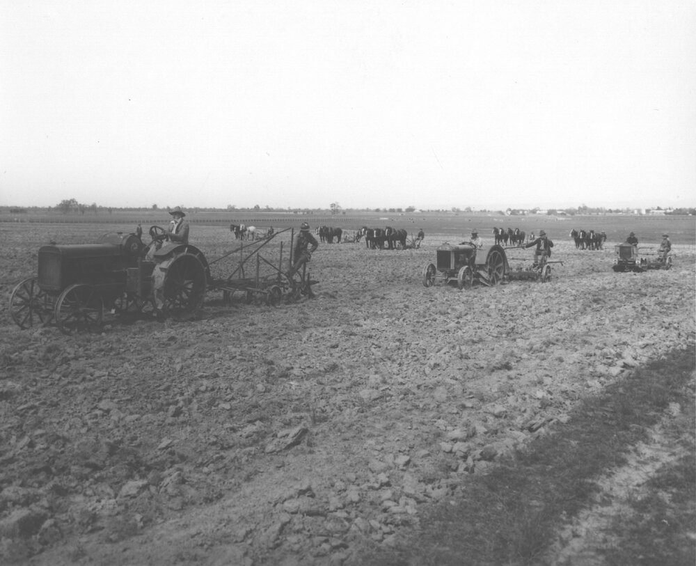 Tractors and horse teams working in the fields [Hawkesbury Agricultural College (HAC)]