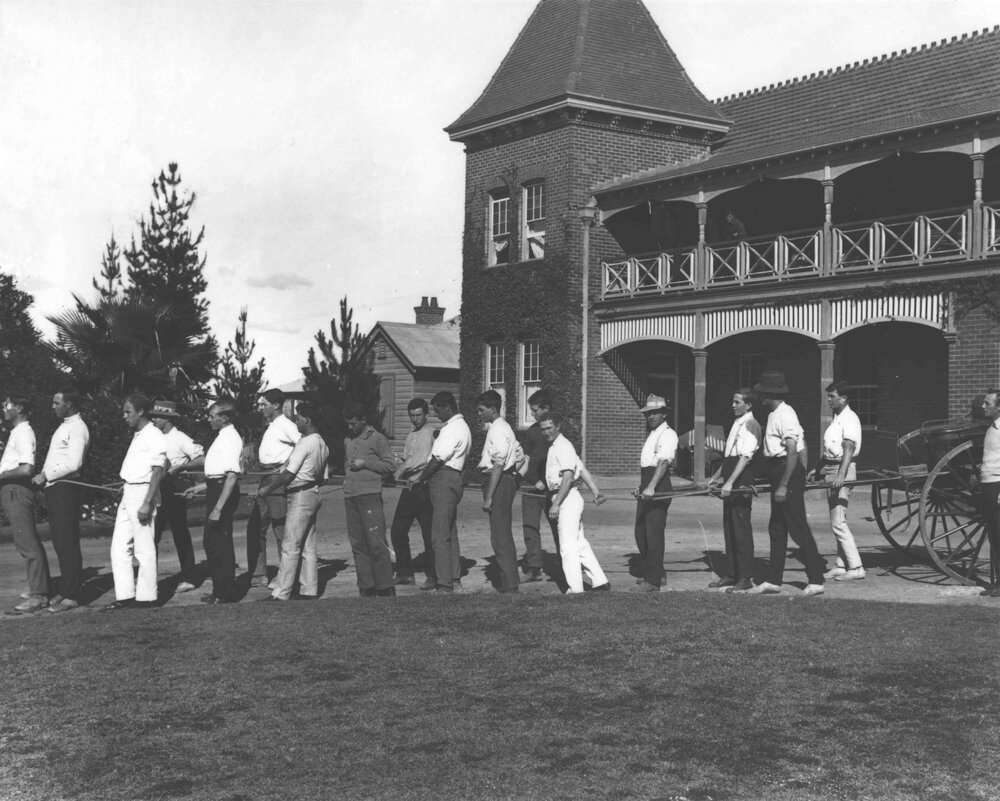 Students standing on the drive outside the Eastern Tower block, participating in a fire brigade drill [Hawkesbury Agricultural College (HAC)]