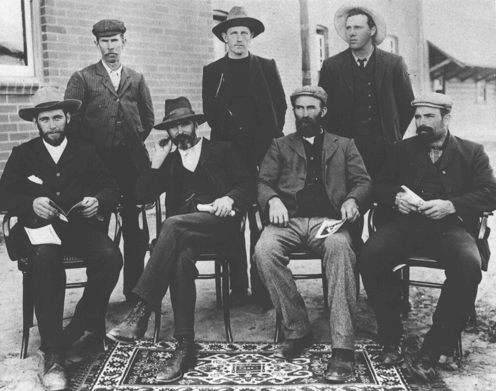 Farmers - four seated and three standing [Hawkesbury Agricultural College (HAC)]