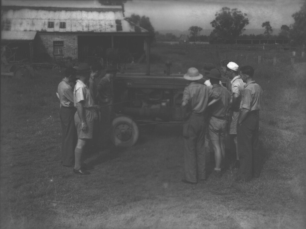 Staff and students standing around a tractor [Hawkesbury Agricultural College (HAC)]