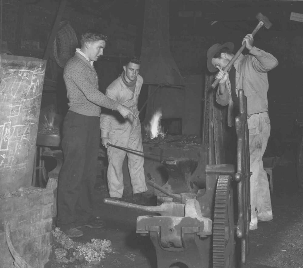 Blacksmith Shop (interior) - Students at work under instruction [Hawkesbury Agricultural College (HAC)]