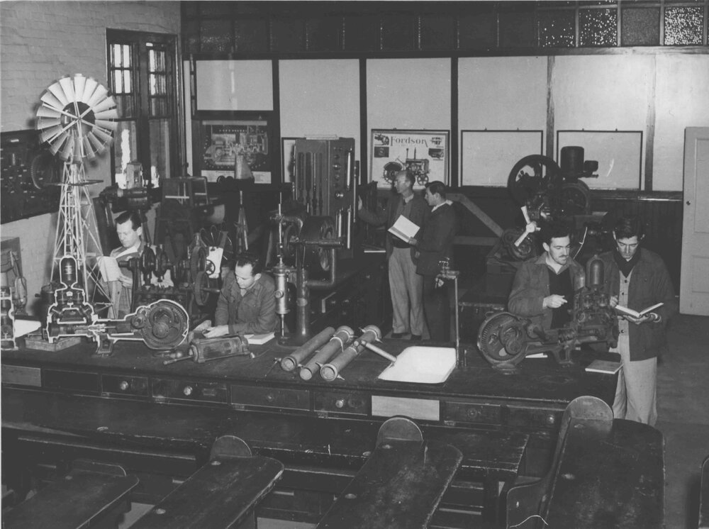 Students working in the Mechanical Laboratory - with working model of a Comet windmill [Hawkesbury Agricultural College (HAC)]