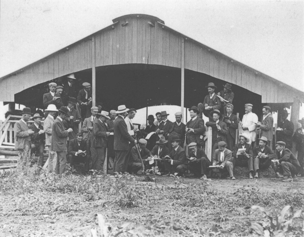 Farm Manure Lecture - Farmers listening and taking notes outside a farm shed [Hawkesbury Agricultural College (HAC)]
