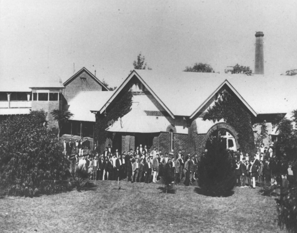 Students standing outside the Dining Hall waiting to enter for lunch [Hawkesbury Agricultural College (HAC)]
