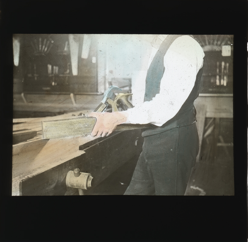 Woodworking - adjusting the blade of a wooden hand plane [Hawkesbury Agricultural College (HAC)]