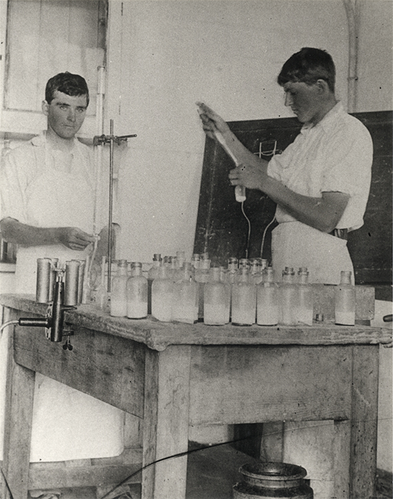 Dairy Factory (interior) - Students carrying out Babcock tests for butterfat content in milk [Hawkesbury Agricultural College (HAC)]