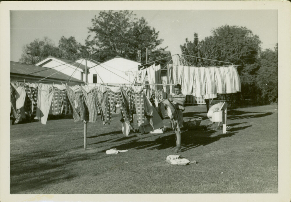 Laundry Boy at the clothesline