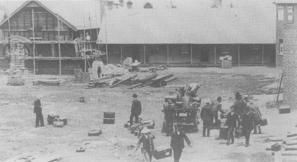 Main Administration Building - Under construction, teachers arriving [Hawkesbury Agricultural College (HAC)]