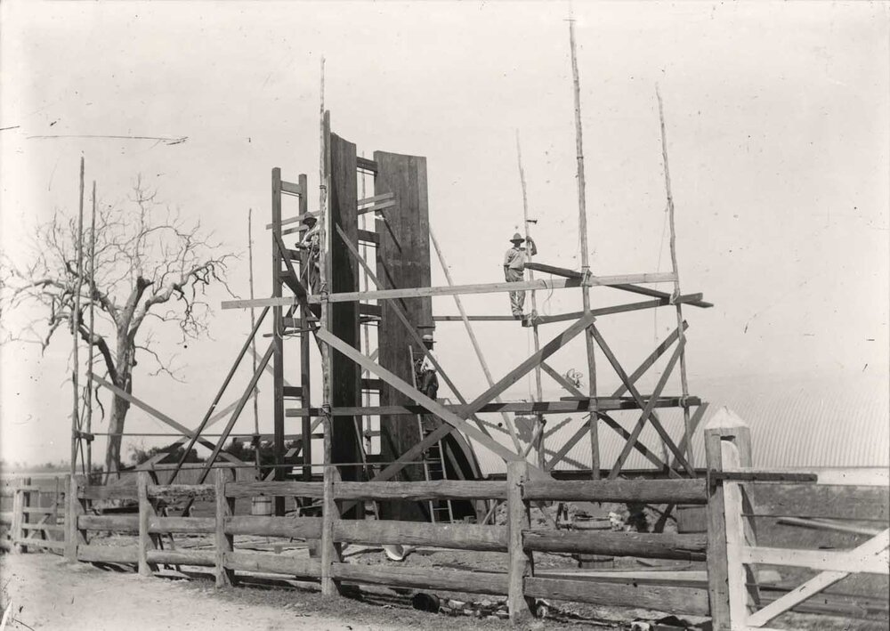 Construction of twin timber silos at the Dairy - construction workers standing on scaffolding (Print 2 of 2) - Uncropped version [Hawkesbury Agricultural College (HAC)]