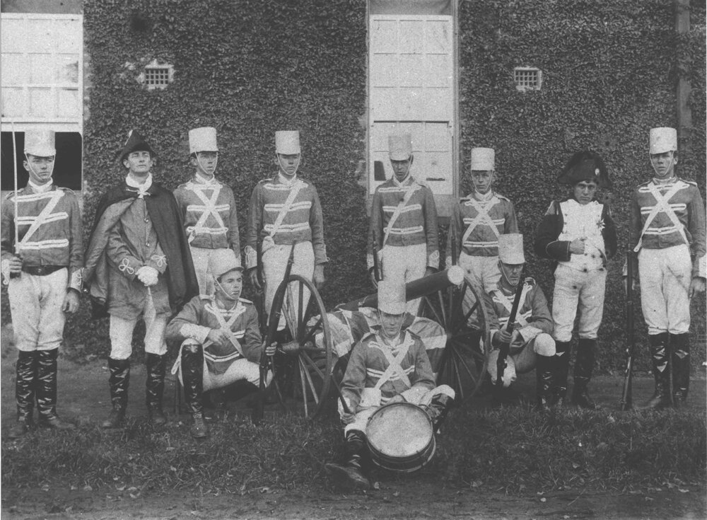 Empire Day - Students dressed up - English army uniforms, with a cannon and drum as props [Hawkesbury Agricultural College (HAC)]