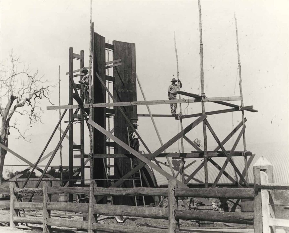 Construction of twin timber silos at the Dairy - construction workers standing on scaffolding (Print 1 of 2) - Cropped version [Hawkesbury Agricultural College (HAC)]