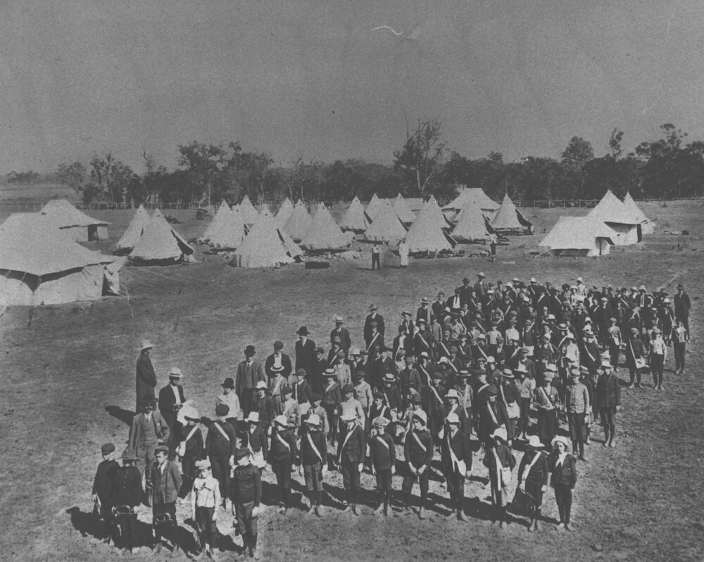 Youth Camp School - Young school students in rows in front of tents pitched at the College [Hawkesbury Agricultural College (HAC)]