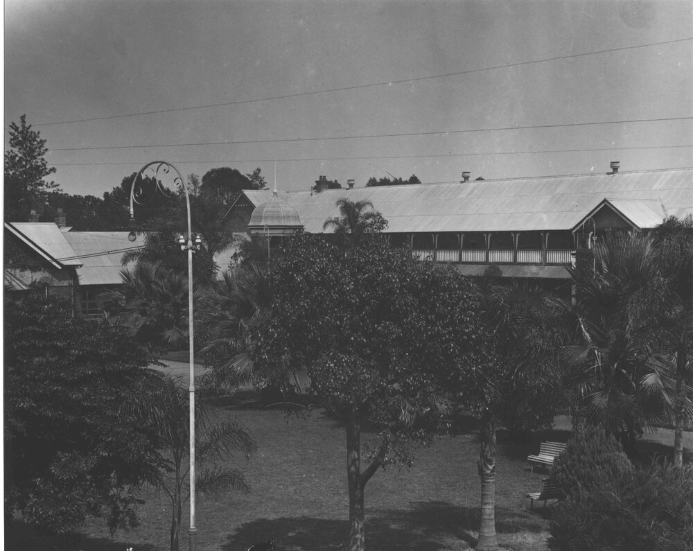 Valder Hall - Dining Hall to the left and garden seats on the lawn [Hawkesbury Agricultural College (HAC)]
