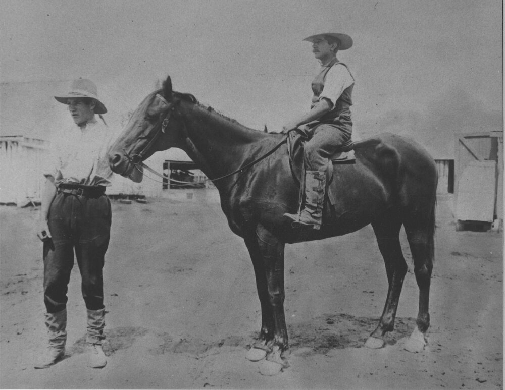 Mounted horseman with another man holding the bridle [Hawkesbury Agricultural College (HAC)]