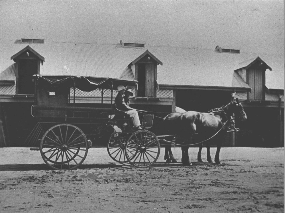 Students seated in a drag in Stable Square [Hawkesbury Agricultural College (HAC)]