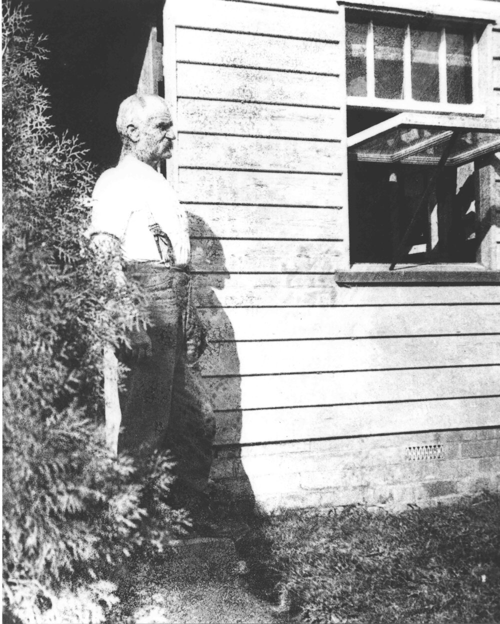 Hugh Reid, Gardener at the College, standing in doorway [Hawkesbury Agricultural College (HAC)]