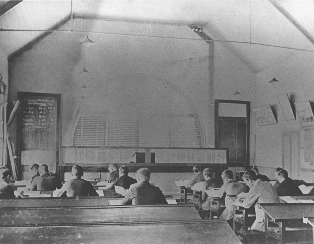 Classroom - Students seated at desks in lecture room in the Main Building [Hawkesbury Agricultural College (HAC)]