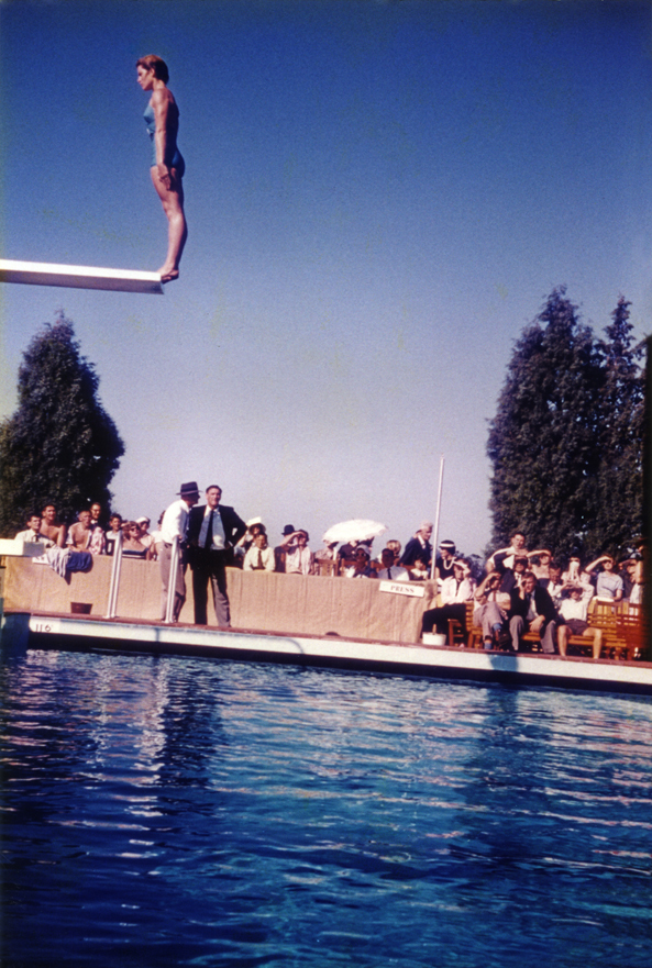 Olympic Swimming Pool - Opening - A woman preparing to dive from the diving board [Hawkesbury Agricultural College (HAC)]