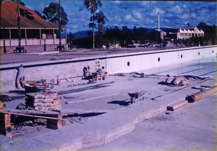 Olympic Swimming Pool - Construction (print 13 of 18) - Tiling the wall at the shallow end [Hawkesbury Agricultural College (HAC)]