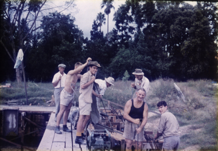 Olympic Swimming Pool - Construction (print 06 of 18) - Students and staff pouring concrete for a section of wall using mechanical vibrators for compaction [Hawkesbury Agricultural College (HAC)]