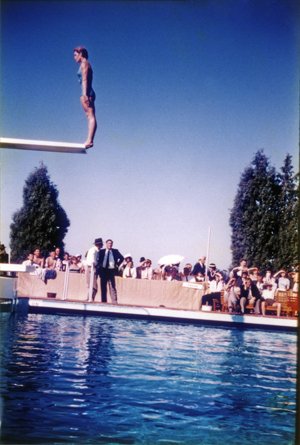 Olympic Swimming Pool - Opening (print 18 of 18) - A woman preparing to dive from the diving board [Hawkesbury Agricultural College (HAC)]