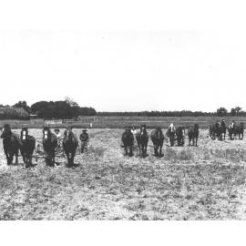 Students ploughing with four teams of horses - an instructor looking on [Hawkesbury Agricultural College (HAC)]