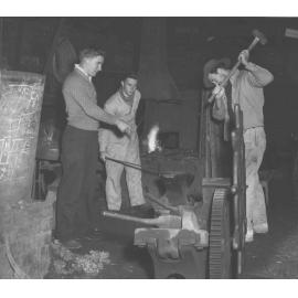 Blacksmith Shop (interior) - Students at work under instruction [Hawkesbury Agricultural College (HAC)]