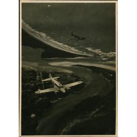 Aerial Photograph - Two A4 Avro Anson planes flying over a river