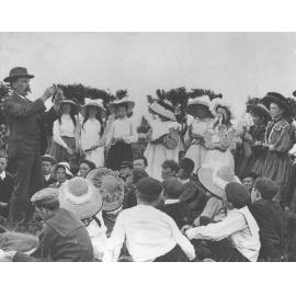 Charles T Musson, Lecturer in Botany and Entomology, giving a class outside to a group of school children [Hawkesbury Agricultural College (HAC)]