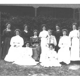 Main Administration Building - Group of women seated and standing [Hawkesbury Agricultural College (HAC)]