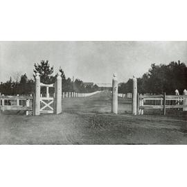 The front gates to the College with Administration Buildings (?) in the background (Cropped) [Hawkesbury Agricultural College (HAC)]