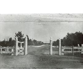 The front gates to the College with Administration Buildings (?) in the background (Unropped) [Hawkesbury Agricultural College (HAC)]