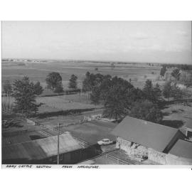 View from the top of the Harvestore towards the Dairy cattle section - hay shed in foreground [Hawkesbury Agricultural College (HAC)]