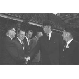 Sir Roden Cutler (Governor of NSW) shaking hands with an unidentified man [Hawkesbury Agricultural College (HAC)]