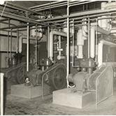 Dairy Factory (interior): showing students at work and machinery (Print 1 of 9) [Hawkesbury Agricultural College (HAC)]