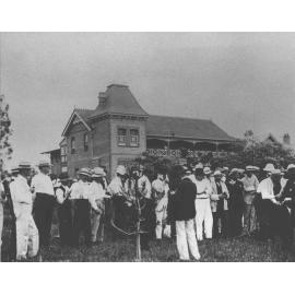 Winter School for Farmers, 1906 - student farmers observing a demonstration from the horticulture lecturer at the Shrubbery, near the Fairy Circle [Hawkesbury Agricultural College (HAC)]