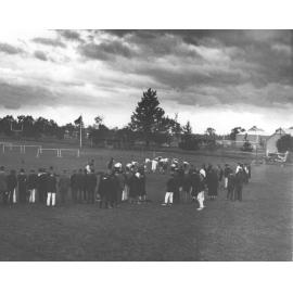 Crowd watching a student race on the oval - may be the half mile race [Hawkesbury Agricultural College (HAC)]