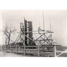 Construction of twin timber silos at the Dairy - construction workers standing on scaffolding (Print 2 of 2) - Uncropped version [Hawkesbury Agricultural College (HAC)]