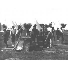 Camp Kitchen - Staff and school students cooking (outdoors), tents in background [Hawkesbury Agricultural College (HAC)]