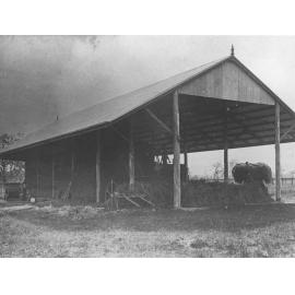 Students stacking hay into hay shed [Hawkesbury Agricultural College (HAC)]