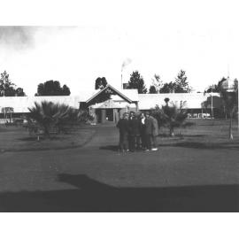 Students standing in the Quadrangle with the Dining Hall in the background [Hawkesbury Agricultural College (HAC)]
