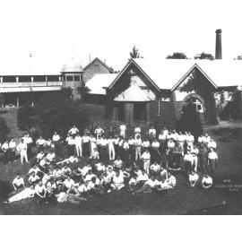 Dining Hall - Students sitting and standing on the lawn outside [Hawkesbury Agricultural College (HAC)]