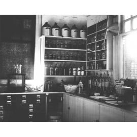 Chemical Laboratory - Shelves with a large number of bottles and equipment [Hawkesbury Agricultural College (HAC)]