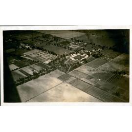 Aerial views of Hawkesbury Agricultural College, showing administrative and accommodation blocks, stable square, dairy and orchard buildings, and the front drive [Hawkesbury Agricultural College (HAC)] - Print 2 of 2